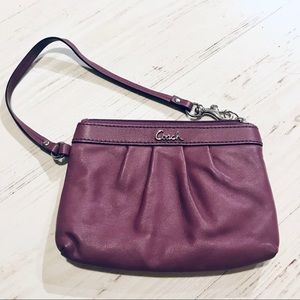 COACH purple leather wristlet